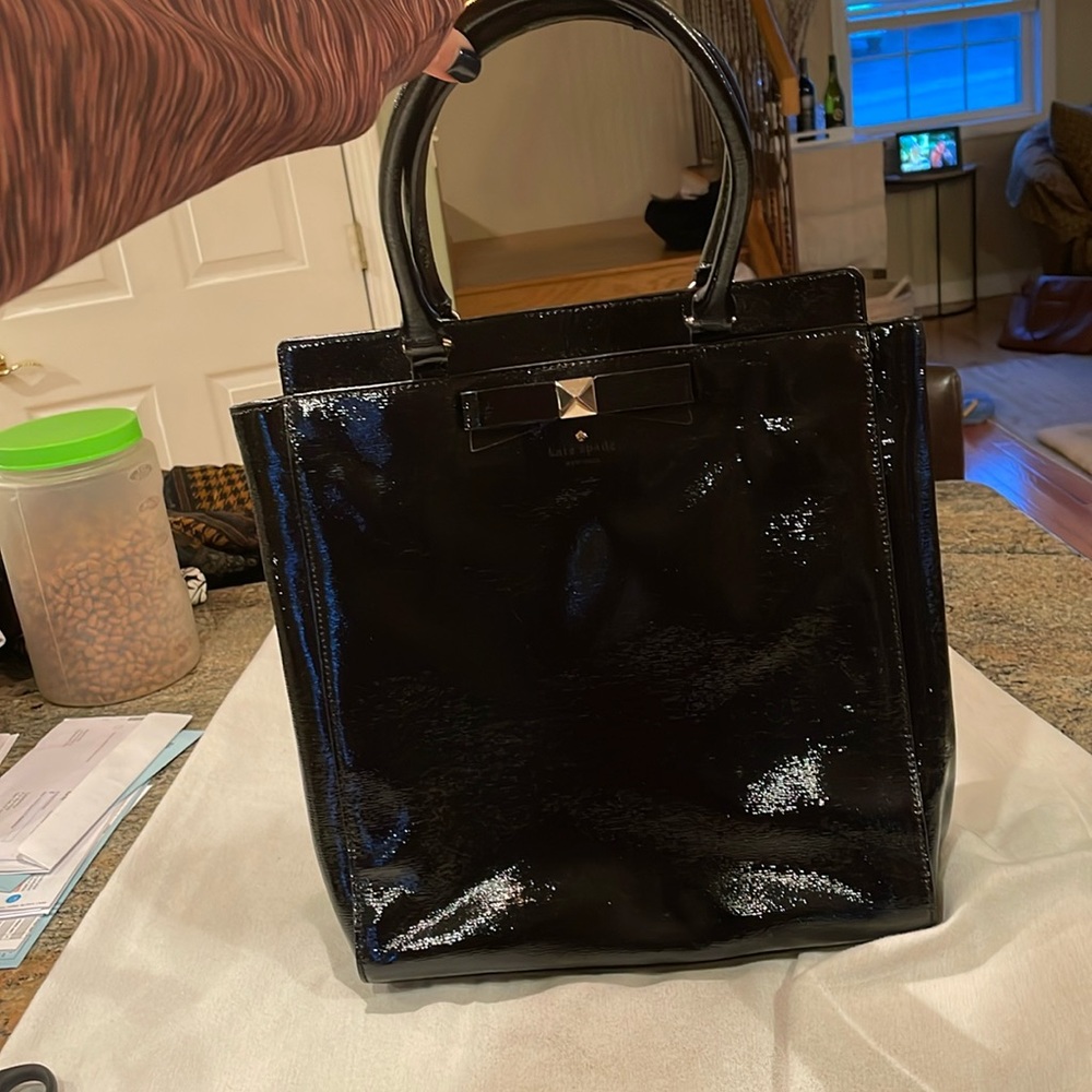Kate Spade black patten leather tall pocketbook